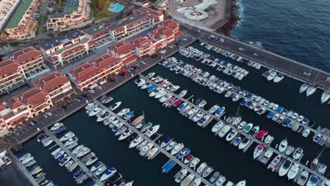 Fleet-of-private-boats-parked-at-Los-Gigantes-Harbour-Tenerife-aerial