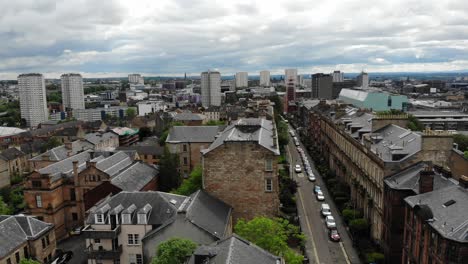 Aerial-cityscape-of-Glasgow-City-high-rise-buildings-in-Scotland--Drone-view
