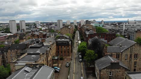Aerial-drone-view-of-Glasgow-City-streets-in-Scotland,-United-Kingdom