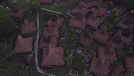 Drone-shot-of-Kampung-Situs-Yarro-Wora-at-Sumba-island-during-sunrise,-aerial