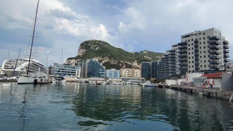 Hand-held-shot-of-the-harbor-and-bay-within-Gibraltar-during-daylight