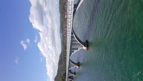 Vertical-drone-shot-of-Los-Puentos-Bridge-with-arches-during-sunny-day-in-Samana,-Dominican-Republic