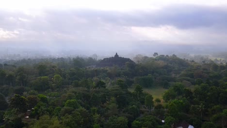 Dreamy-aerial-of-unesco-temple-Borobudur,-circling-wide-shot