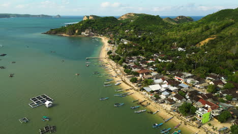 Moored-boats-of-fishermen-in-Lombok-island,-aerial-drone-view