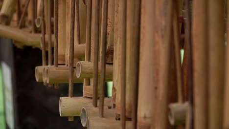 Angklung-musical-instruments-are-hung-in-a-row