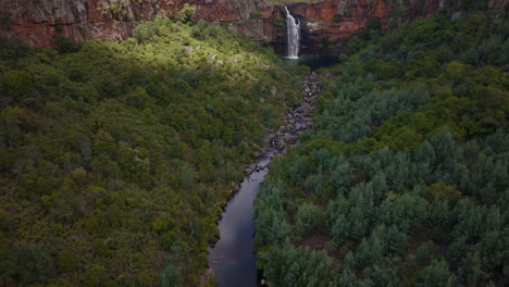 South-Africa-aerial-drone-Lisbon-Berlin-Falls-waterfalls-Sabie-cinematic-Kruger-National-Park-partially-cloudy-lush-spring-summer-green-stunning-river-landscape-bush-slowly-forward-pan-up-movement