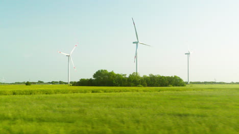 Wind-Farm-with-Abundant-Wind-Turbines-Set-against-Blue-Sky
