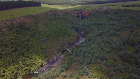 South-Africa-aerial-drone-Lisbon-Berlin-Falls-waterfalls-Sabie-cinematic-Kruger-National-Park-partially-cloudy-lush-spring-summer-green-stunning-river-landscape-bush-slowly-forward-pan-up-movement