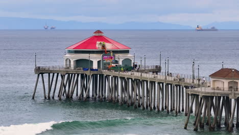 An-aerial-4K-video-shows-a-pier-stretching-out-into-the-ocean
