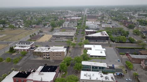 Downtown-Michigan-City,-Indiana-with-drone-video-moving-in-a-circle