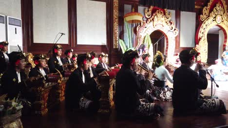 Gamelan-Musical-Orchestra-Plays-Live-at-Bali-Indonesia-with-Dancers-Onstage,-Balinese-Traditional-Culture-Celebration,-PKB