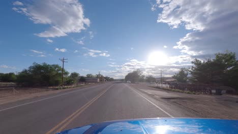 Driving-through-Hanksville,-Utah-on-a-sunny-day---driver-point-of-view