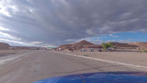 Driving-through-Hanksville,-Utah---driver-point-of-view