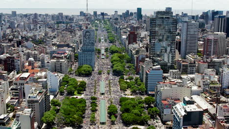 Aerial-establishing-shot-of-9-de-Julio-Avenue-crowded-with-Argentinian-football-soccer-fans-during-2022-World-Cup-celebrations
