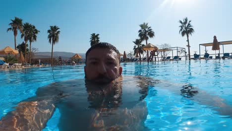 man-inside-the-resort-pool