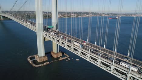 Aerial-Forward-Crane-Towards-Rush-Hour-Traffic-Passing-Over-Verrazzano-Bridge-in-New-York-City