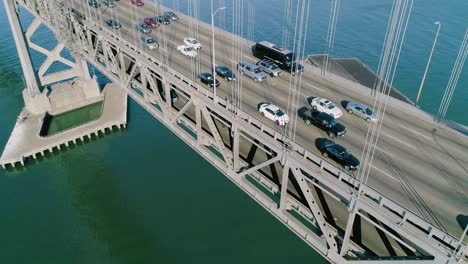 Aerial-Crane-Close-up-of-Heavy-Traffic-on-Oakland-Bay-Bridge