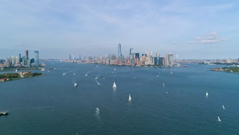 Aerial-Static-Shot-of-New-York-City-Skyline-and-the-Hudson-River-Busy-with-Boats