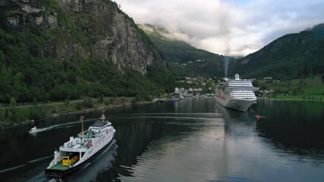 Rear-Following-Shot-of-the-Fjord1-Ferry-Sailing-through-the-Geirangerfjord-Approaching-the-Dock