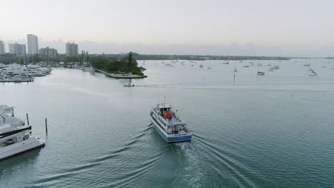 Aerial-Follow-Shot-of-Fishing-Boat-in-Sarasota-Bay-During-Sunrise