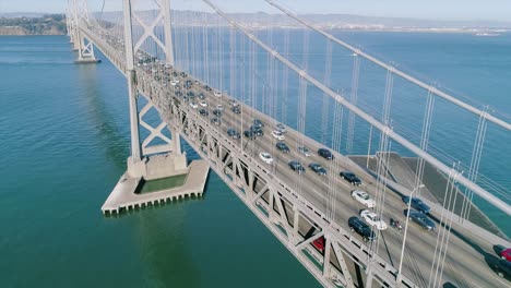 Aerial-Dolly-of-Heaving-Traffic-on-Oakland-Bay-Bridge