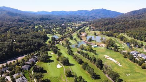 Aerial-Flyover-The-Greenbrier-Golf-Courses-in-White-Sulphur-Springs,-WV-during-summer