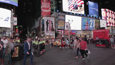 Panning-Shot-of-Busy-Times-Square-in-Manhattan-During-the-Evening