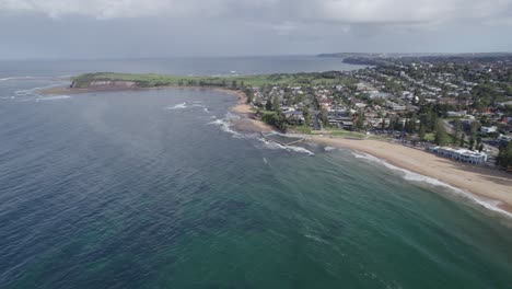 Ocean-Rockpool-And-Collaroy-Beach-In-Sydney,-NSW,-Australia---aerial-drone-shot