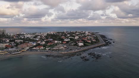 Aerial-view-across-Punta-del-Este-seaside-resort-marina-and-cityscape-on-the-coast-of-Uruguay