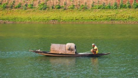 A-fishing-canoe-floats-along-the-river