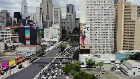 Aerial-tracking-shot-over-traffic-on-the-Prestes-Maia-avenue-in-downtown-Sao-Paulo,-Brazil