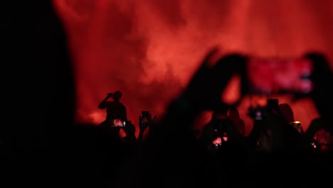 Nighttime-Music-Concerts:-Fans-Record-Videos-of-Singer-on-Stage,-Hold-Smartphones-and-Dance-with-Lights