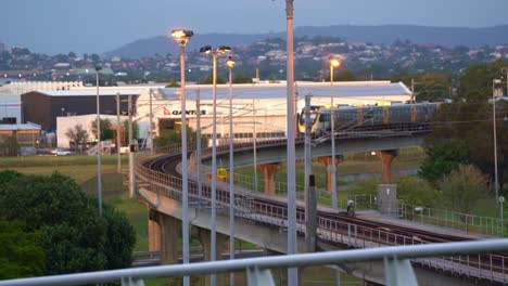 Brisbane-city-airport-train-airtrain-express-railway-service-line-connecting-Gold-Coast-and-central-CBD-to-international-and-domestic-airport-terminals,-Translink-Queensland-network,-Australia
