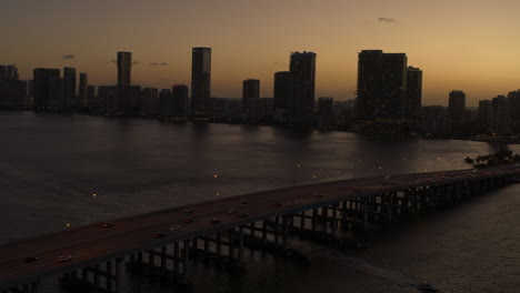 Miami-Bridge-with-Downtown-Miami-In-The-Background-at-Sunset-Aerial-Shot
