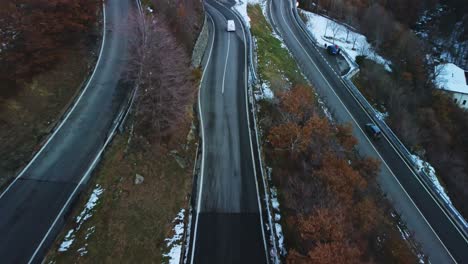 Vehicles-travelling-through-the-windy-roads-of-Northern-Italy-captured-by-Drone