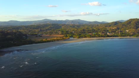 Aerial-view-of-Samara-Beach-and-town-in-the-Guanacaste-Province,-Costa-Rica