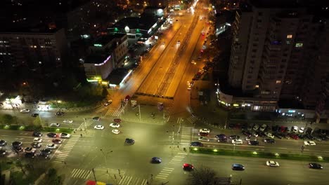 Traffic-At-The-Intersection-Of-Iuliu-Maniu-Boulevard-At-Night-In-City-Of-Bucharest,-Romania