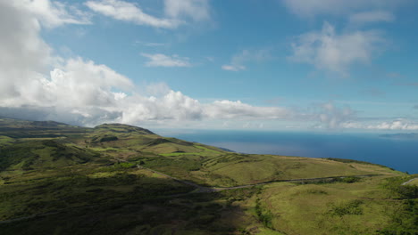 Aerial-circular-footage-of-green-nature-on-island-in-Atlantic-Ocean
