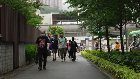 asiatic-pedestrian-walking-safety-in-the-city-center-of-the-metropolis