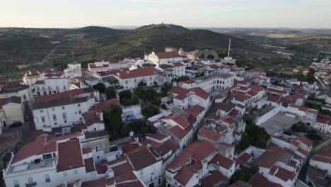 Aerial-Flying-Over-Elvas-Town-Rooftops-To-Reveal-Castle-On-Hilltop