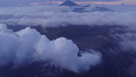 Amazing-landscape-at-mount-bromo-east-java-with-white-steam-and-clouds,-aerial