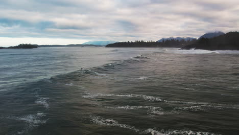 Surfing-In-The-Pacific-Ocean-In-The-Coast-Of-Tofino-On-Vancouver-Island,-Canada
