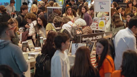 Crowd-of-youth,-adults,-and-elderly-roam-through-Buenos-Aires-Bookfair