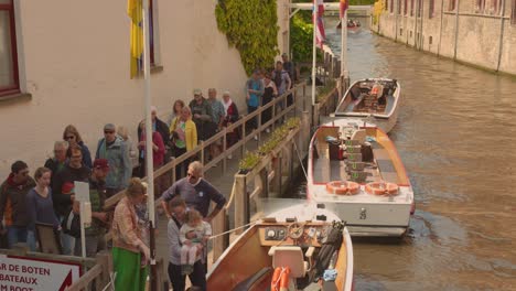 People-On-Line-At-The-Cruise-Port-In-Bruges,-Belgium