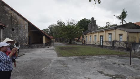 tourists-exploring-the-historic-Con-Dao-Prison-in-Vietnam