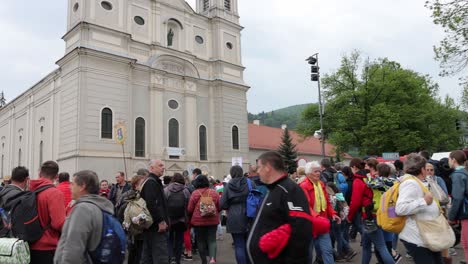 Crowd-of-people-standing-outside-Franciscan-Church,-on-Csiksomlyo-Pilgrimage