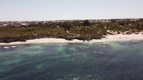 Deep-blue-sea,-white-sandy-beaches-and-beyond-at-the-Ocean-Reef-Perth
