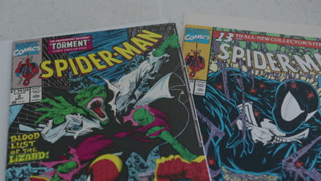 Close-Up-Pan-Right-of-Two-Spider-Man-Comic-Books