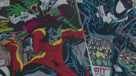 Close-Up-Tilt-Up-of-Two-Spider-Man-Comic-Books