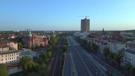 Fantastic-aerial-top-view-flight-Freeway,-Historic-school-building-Berlin-city-Germany-in-Europe,-summer-day-2023